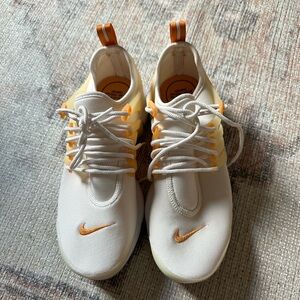 Brand new Nike shoes, size: 7, color, orange and cream